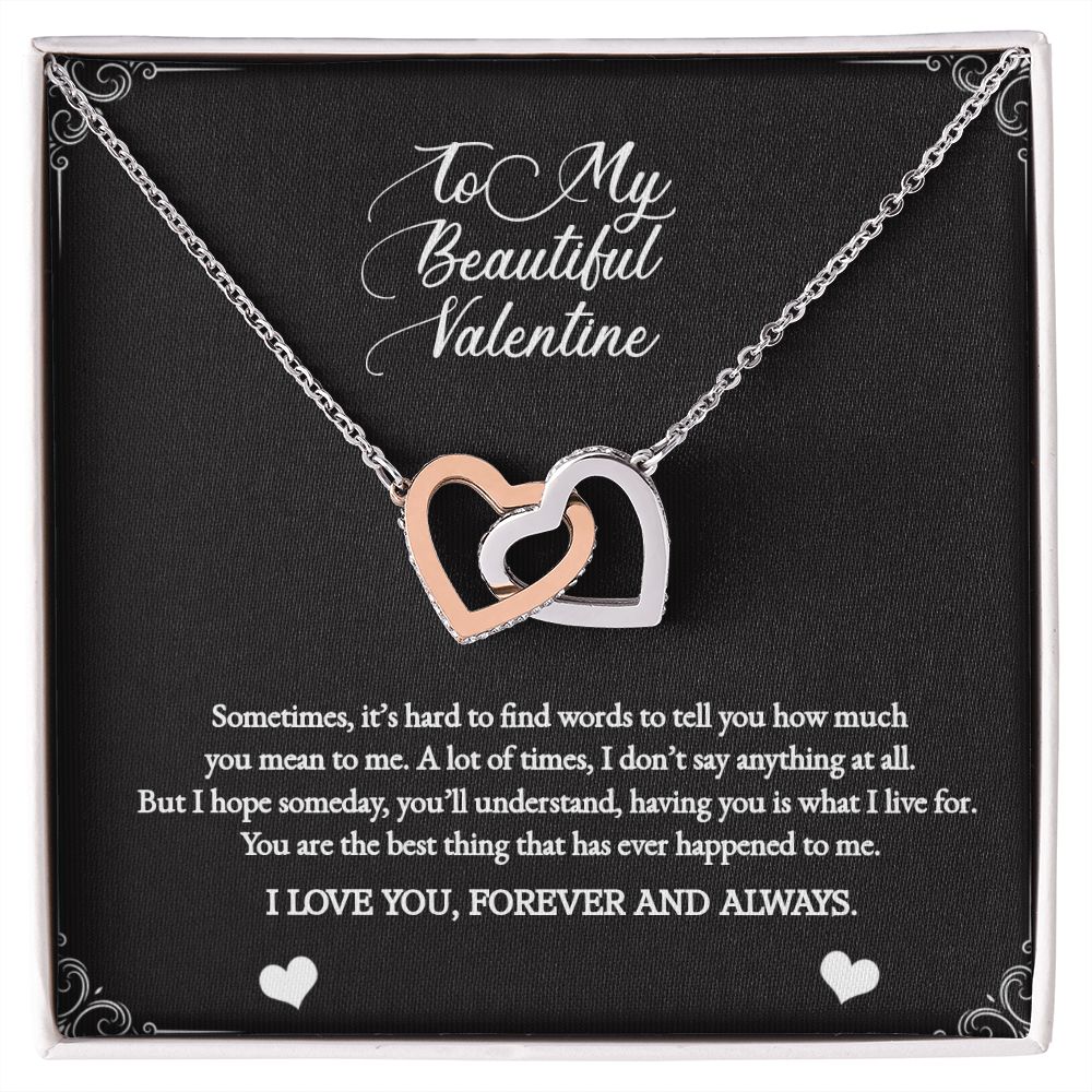 Interlocking white and yellow gold hearts